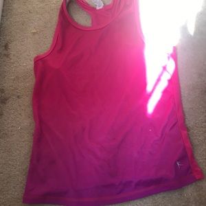 A pink and purple sports shirt for kids